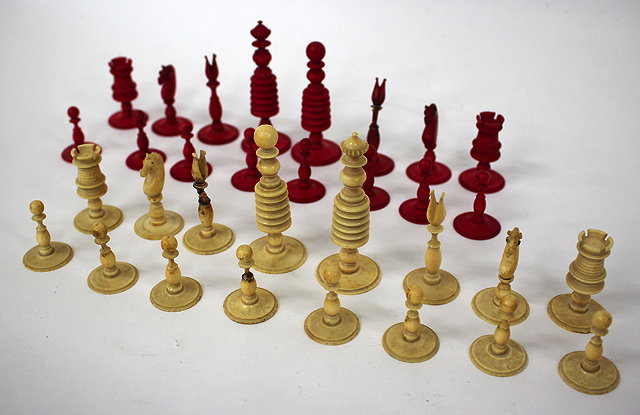 Appraisal: A TH CENTURY TURNED IVORY CHESS SET the Bishop cm