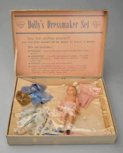 Appraisal: Dolly s Dress Maker Set Description Includes Effanbee miniature doll