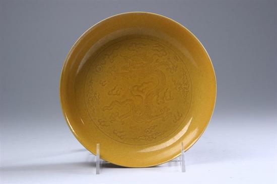 Appraisal: CHINESE YELLOW PORCELAIN DRAGON SAUCER Jiaqing seal mark - in