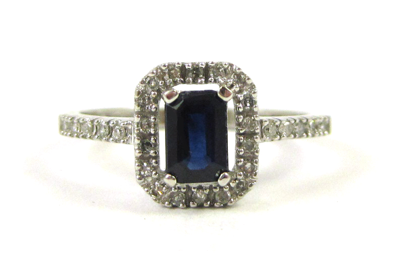 Appraisal: SAPPHIRE DIAMOND AND FOURTEEN KARAT GOLD RING The white gold