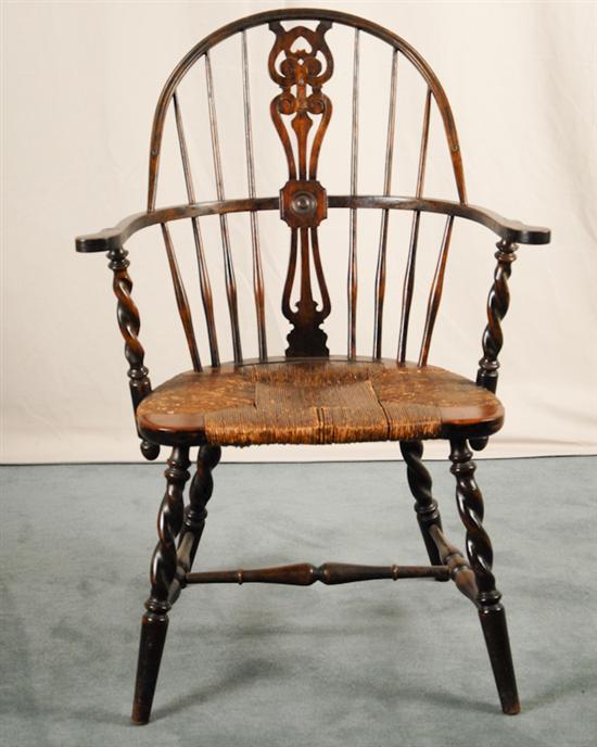 Appraisal: An English Bow-back Windsor Chair with a pierced splat curved