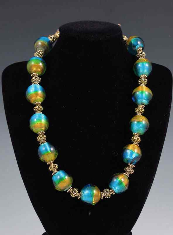 Appraisal: VENETIAN GLASS BEAD NECKLACE With a Swarovski crystal encrusted bead