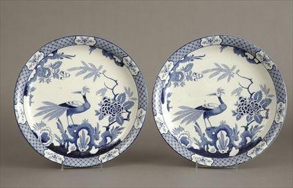 Appraisal: Two Wood Son Blue Transfer-Printed Pottery 'Yuan' Pattern Chargers Each