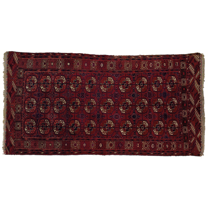 Appraisal: Turkoman rug c stylized floral design on a red field