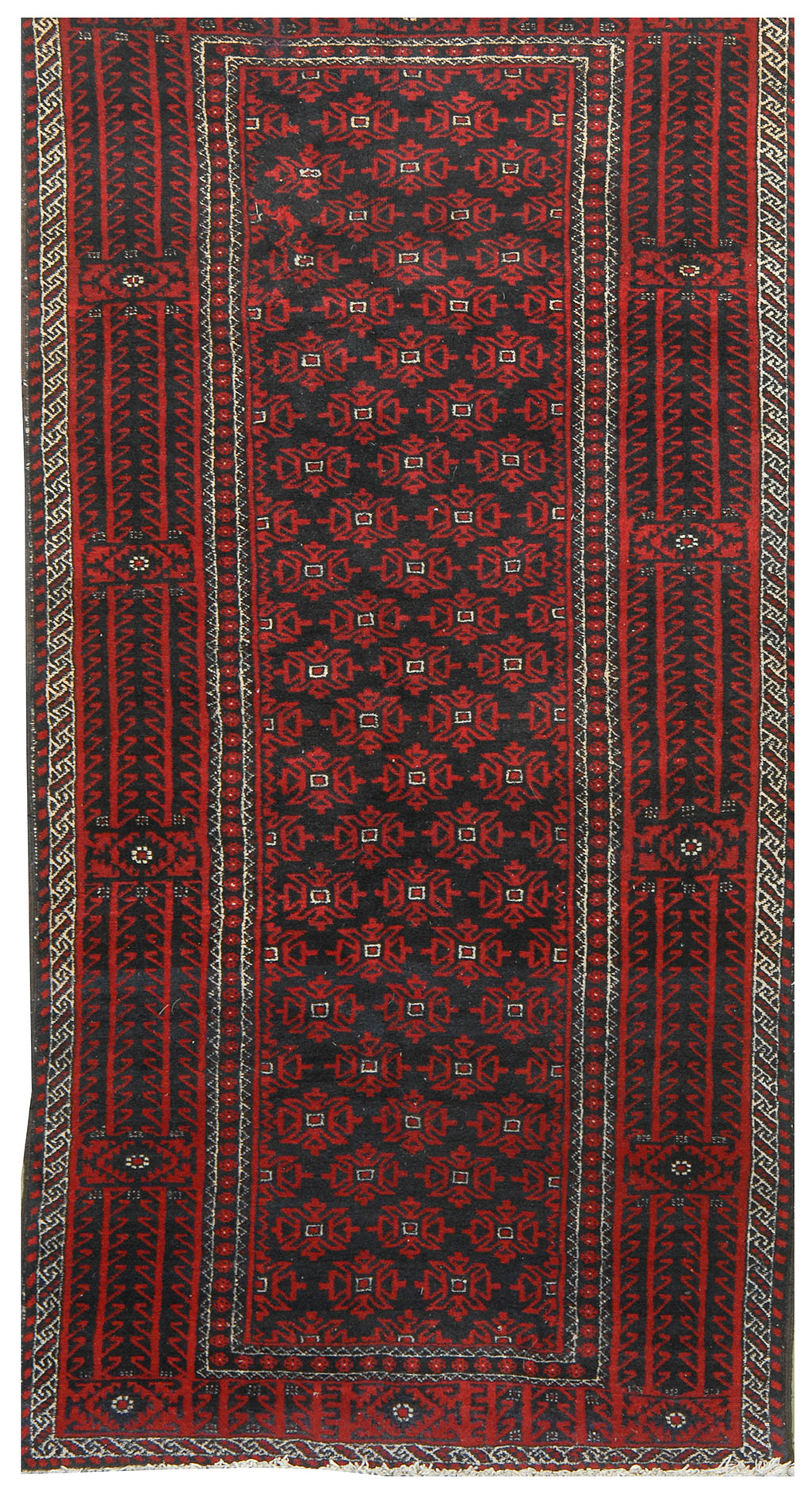 Appraisal: ORIENTAL RUG BELOUCH ' x ' Black field covered with