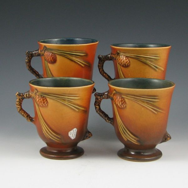 Appraisal: Four Roseville brown Pine Cone cups or cup-shaped vases Two