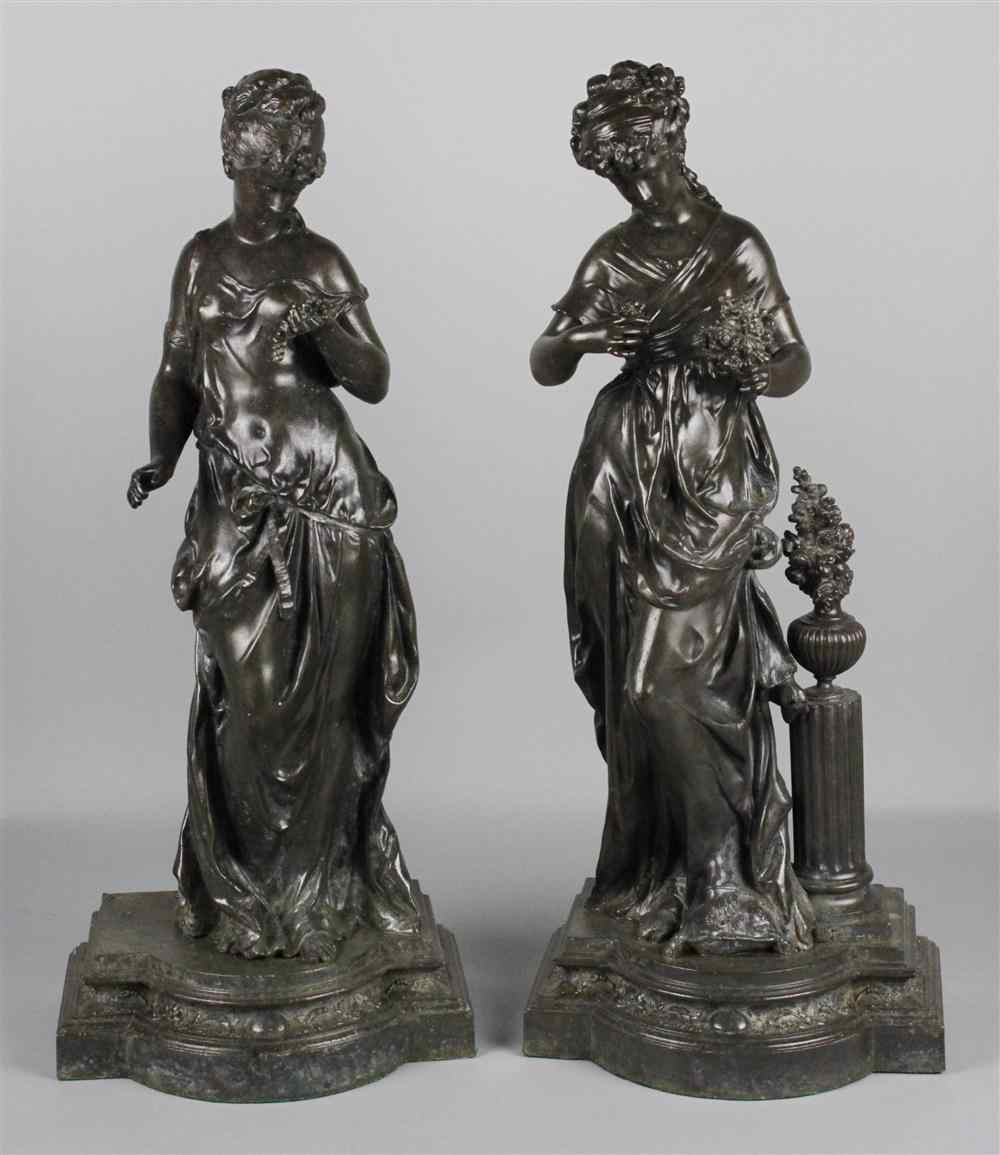 Appraisal: TWO PATINATED METAL FIGURES OF SEASONS each modeled as a