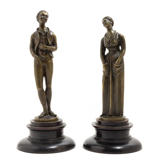 Appraisal: Sale Lot A Pair of Patinated Bronze Figures depicting an