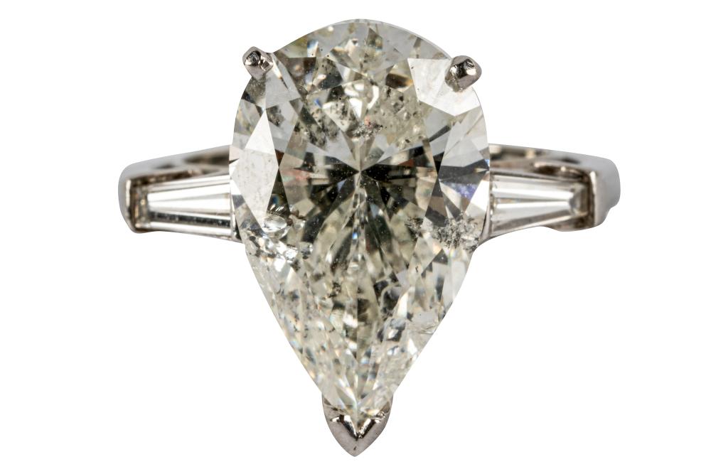 Appraisal: PLATINUM DIAMOND RINGcentering one pear brilliant cut diamond J I