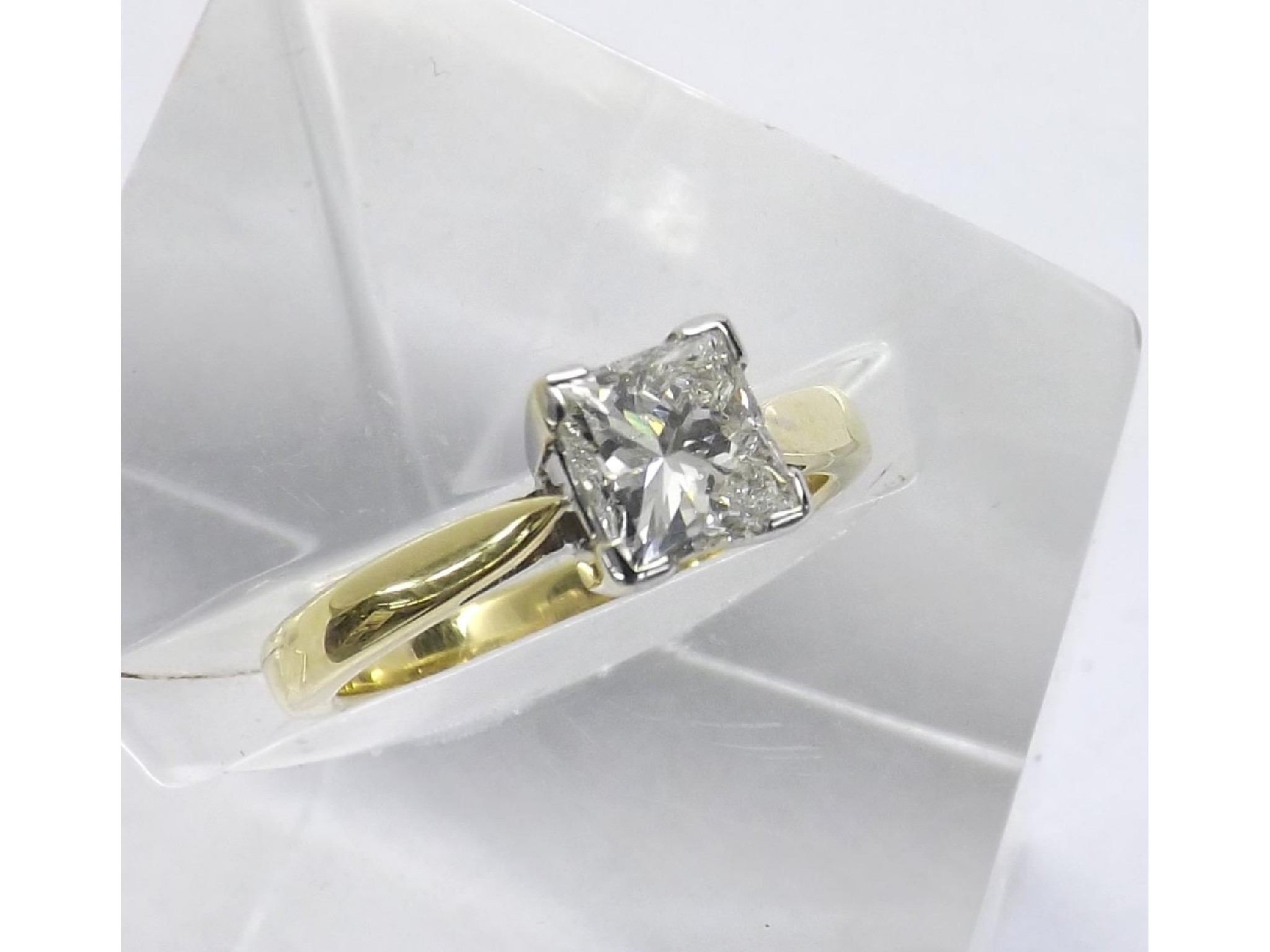 Appraisal: - -a ct yellow gold princess-cut solitaire diamond ring estimated