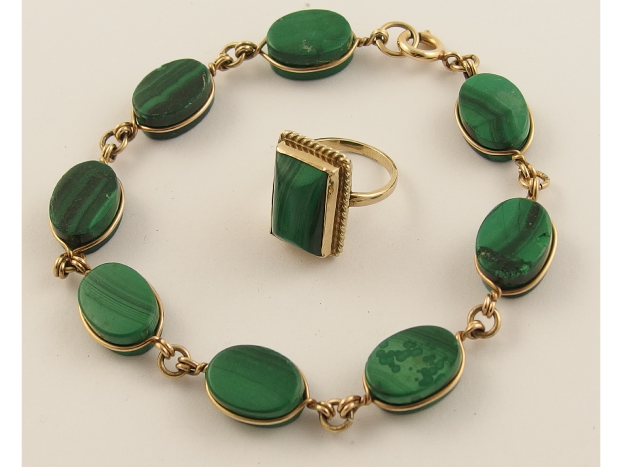 Appraisal: A yellow metal mounted malachite ring and a matching bracelet