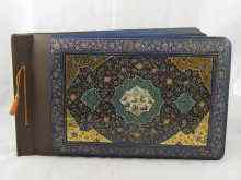 Appraisal: An Iranian hand decorated photograph album measuring approx x cm