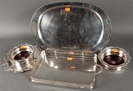 Appraisal: Three silver-plated trays and a pair of Georgian style bottle