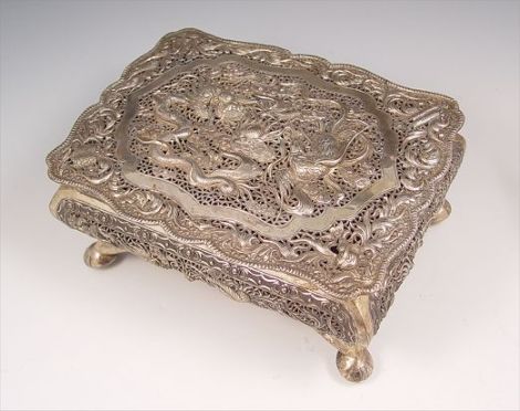 Appraisal: LARGE CHINESE RETICULATED SILVER BOX Rectangular form with ball feet