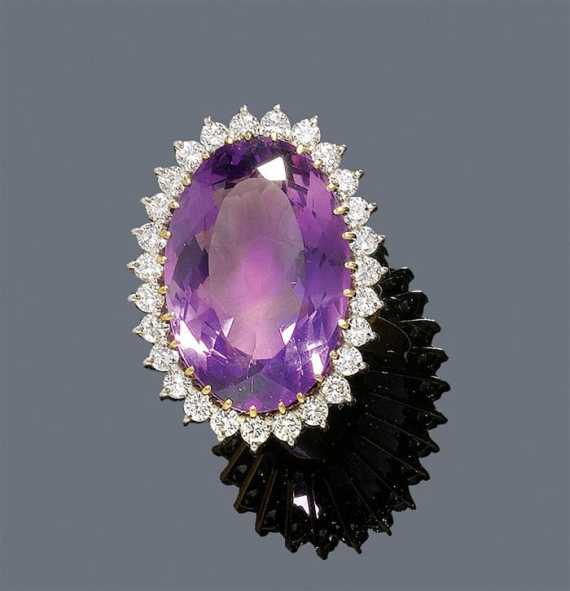 Appraisal: AMETHYST AND DIAMOND RING H STERN Yellow gold Elegant ring