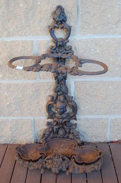 Appraisal: A VICTORIAN STYLE CAST IRON UMBRELLA STAND