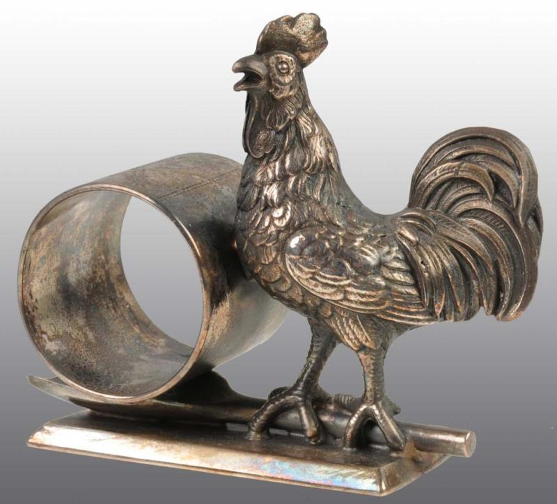 Appraisal: Large Rooster Figural Napkin Ring Description Meriden Rooster standing on