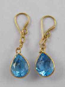 Appraisal: A pair of yellow metal tests ct gold blue topaz