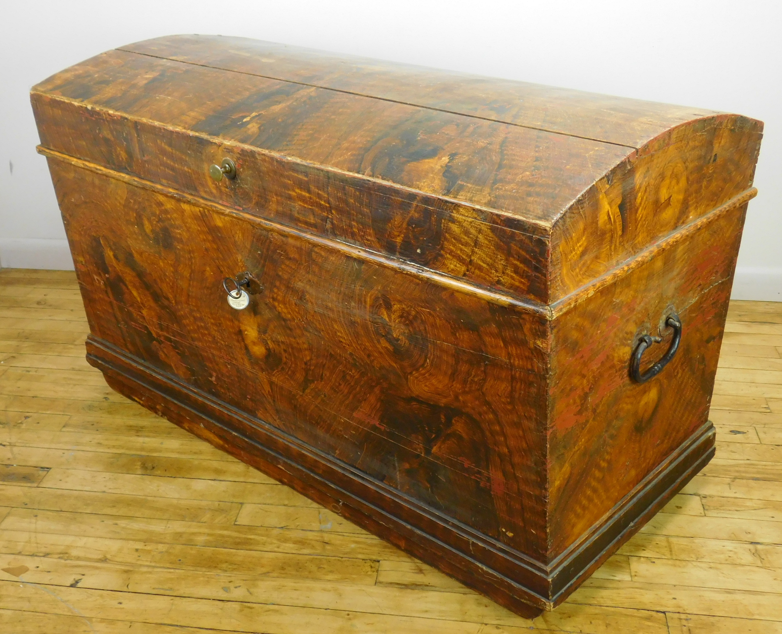 Appraisal: th c Domed trunk with hand-decorated surface x x ''