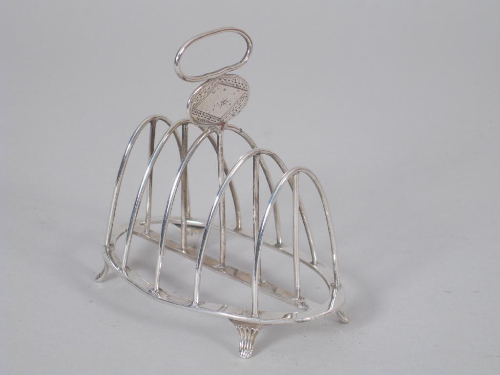 Appraisal: A Victorian wirework five bar Toast Rack engraved initials on