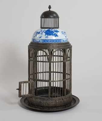 Appraisal: A Large Metal and Porcelain Architectural Bird Cage from Maitland-Smith