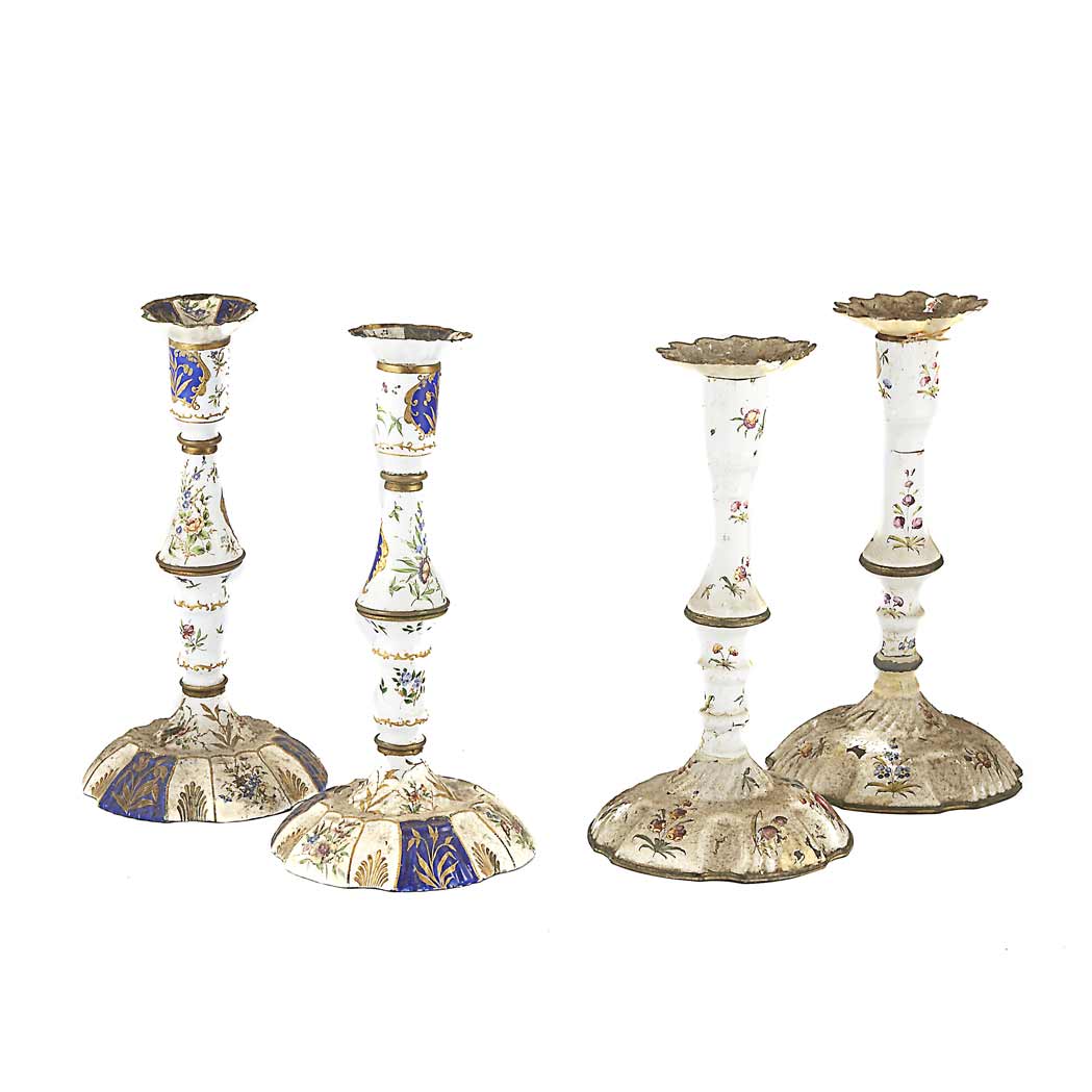 Appraisal: Pair of Battersea Enamel Candlesticks th Century Each painted with