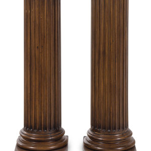 Appraisal: A Pair of Fluted Columnar Walnut Pedestals th Century of