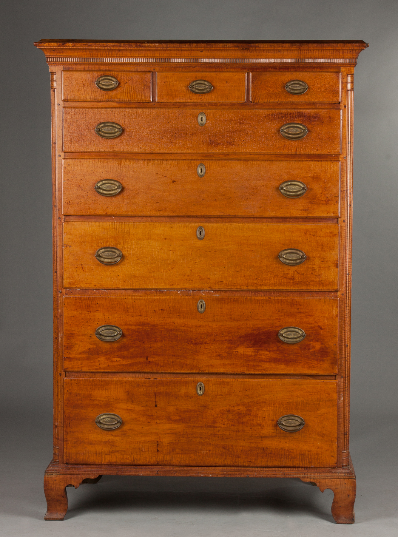 Appraisal: Pennsylvania Chippendale Curly Maple Tall Chest th cent With fluted