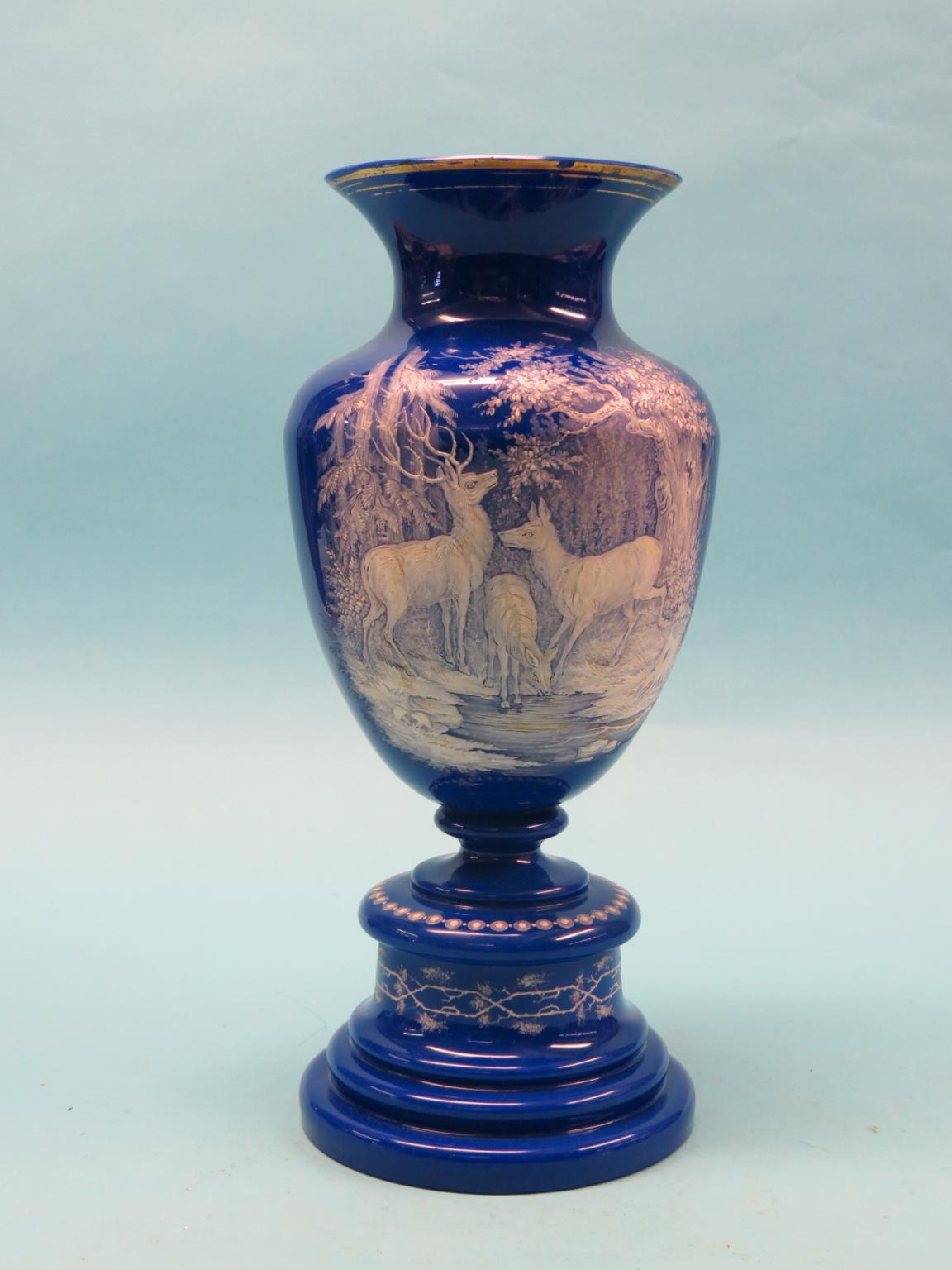 Appraisal: A Victorian opaque blue glass vase baluster-shape white-enamelled with a