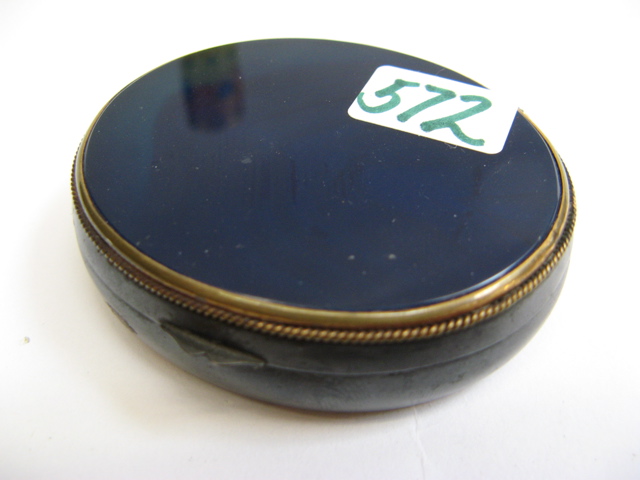 Appraisal: CONTINENTAL AGATE METAL PATCH BOX oval with variegated cobalt blue