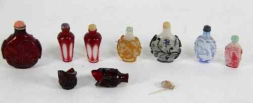 Appraisal: Eight glass snuff bottles cut and overlaid glass various colours