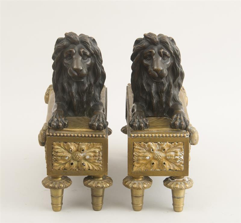 Appraisal: PAIR OF LOUIS XVI STYLE BRONZE AND GILT-BRONZE LION-FORM CHENETS