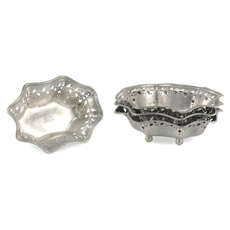 Appraisal: Set of Four Tiffany Co Sterling Silver Pierced Nut Dishes