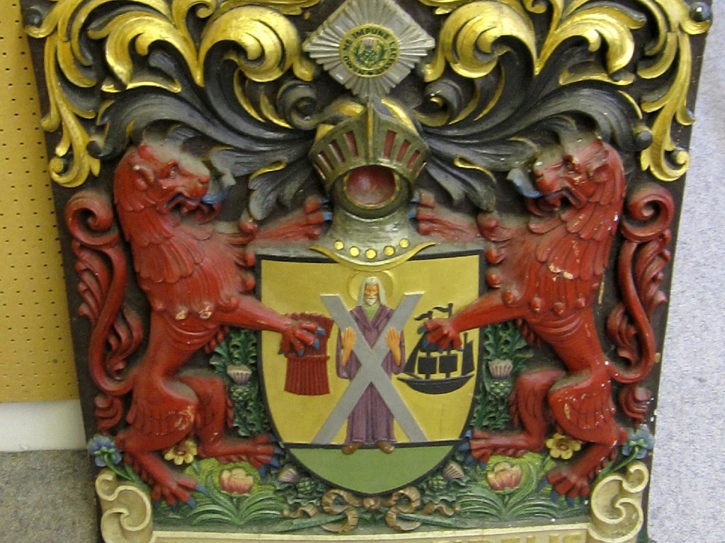 Appraisal: Large carved and painted family crest