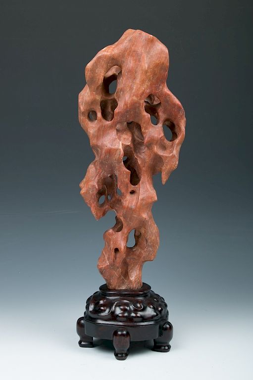 Appraisal: COPPER RED SCHOLAR'S ROCK Of vertical orientation towering in an