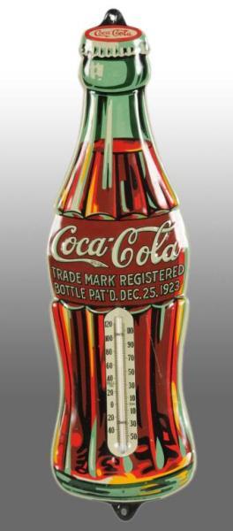 Appraisal: Embossed Tin Coca-Cola Thermometer Description Bright unfaded colors with just