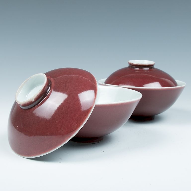 Appraisal: PAIRE OF COPPER RED COVERED BOWL Two sets of porcelain