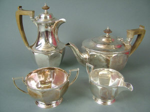 Appraisal: A silver four piece tea service of octagonal outline each