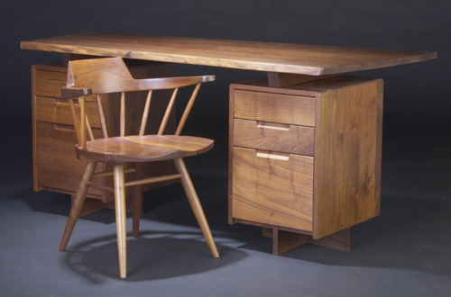 Appraisal: GEORGE NAKASHIMA Walnut double-pedestal desk with six drawers under single-board