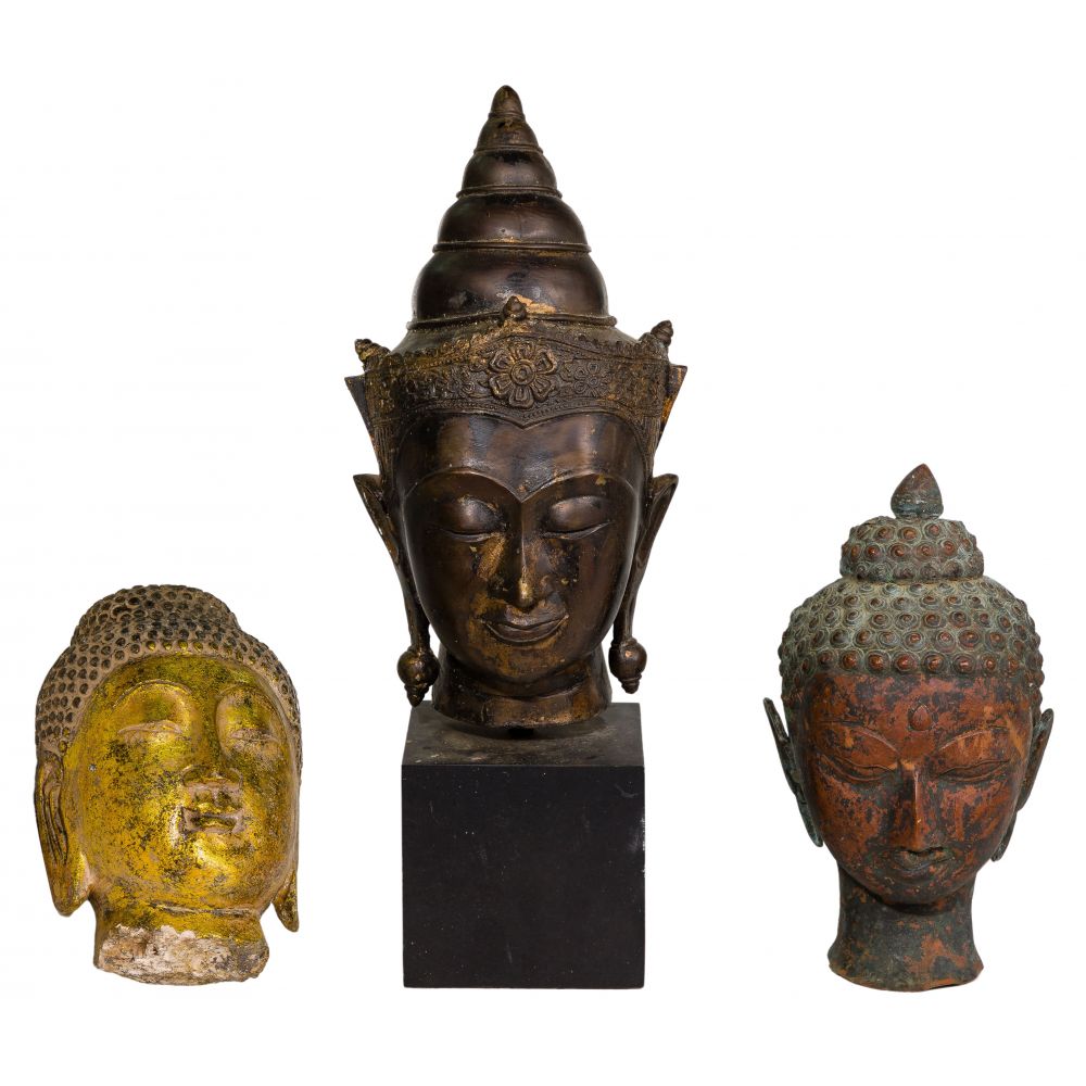 Appraisal: ASIAN BUDDHA HEAD ASSORTMENT items including a gilded stone a