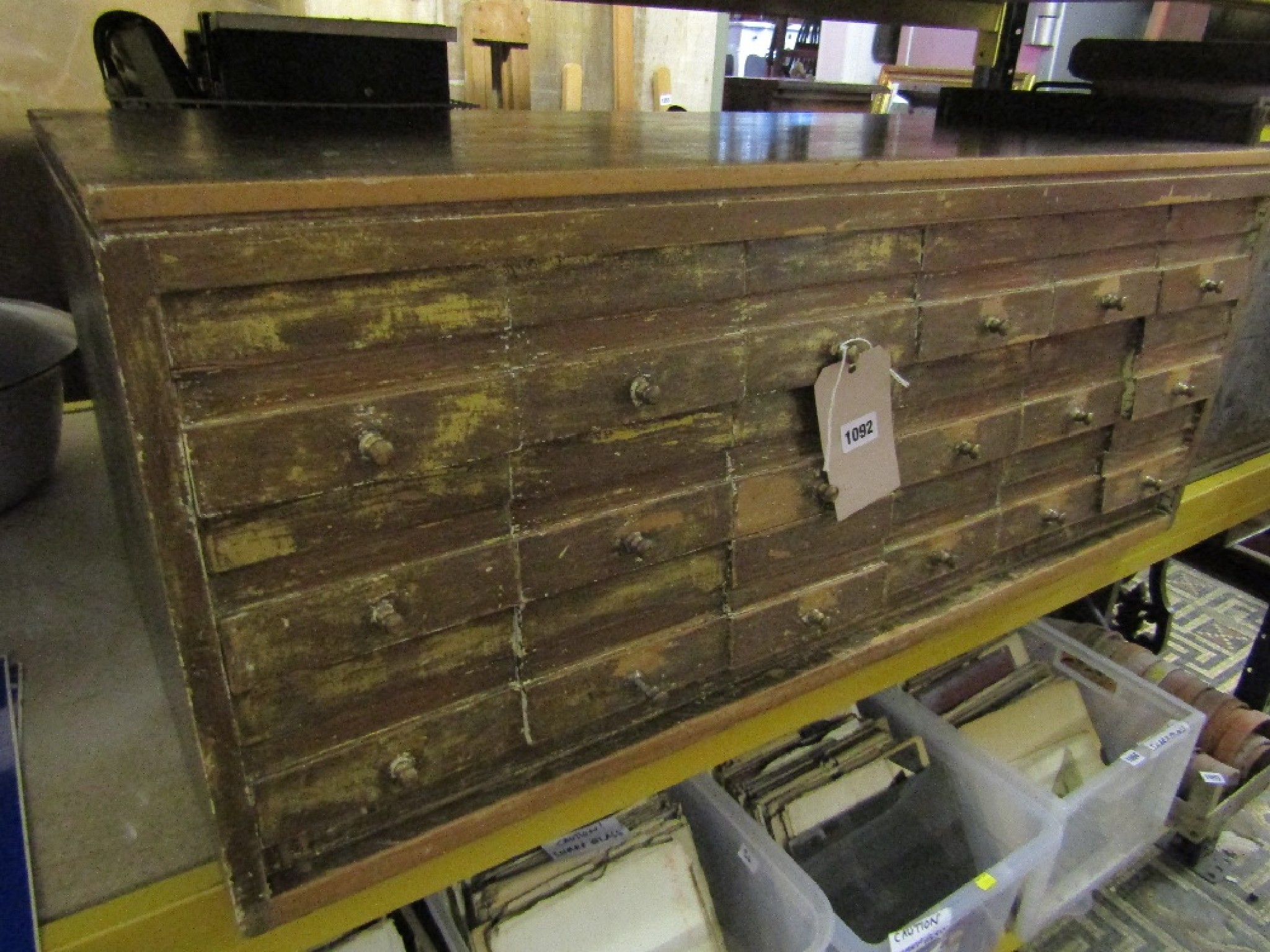 Appraisal: A vintage oak bank of eighteen card index drawers with