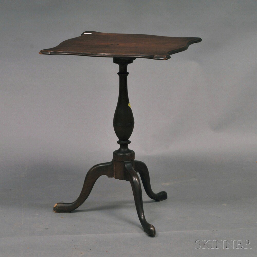 Appraisal: Mahogany Candlestand the thumbmolded square top with serpentine edges on