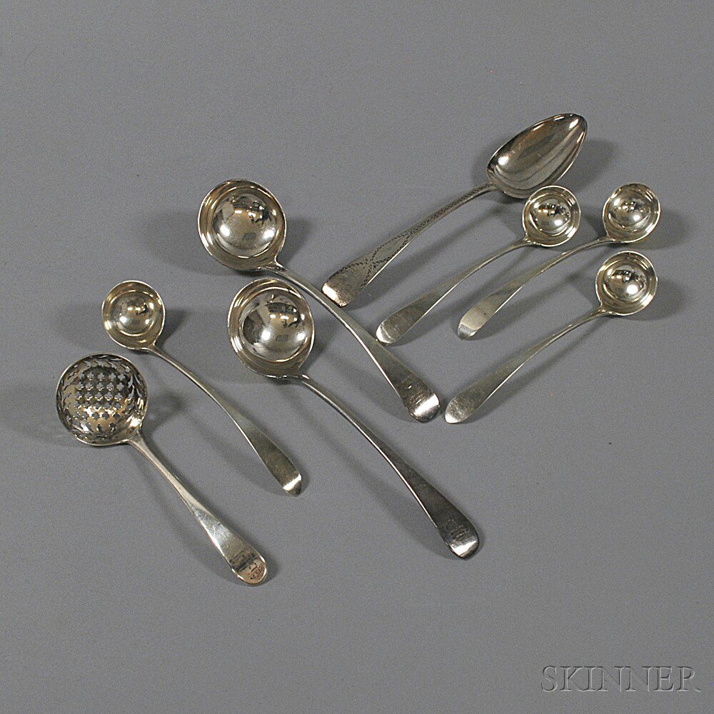 Appraisal: Eight English Sterling Silver Serving Spoons including a pierced strainer