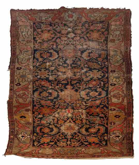 Appraisal: AN ANTIQUE NORTH WESTERN PERSIAN BLUE GROUND RUG with stylised