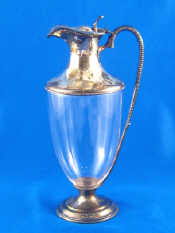 Appraisal: A late Victorian silver mounted urn shaped glass claret jug