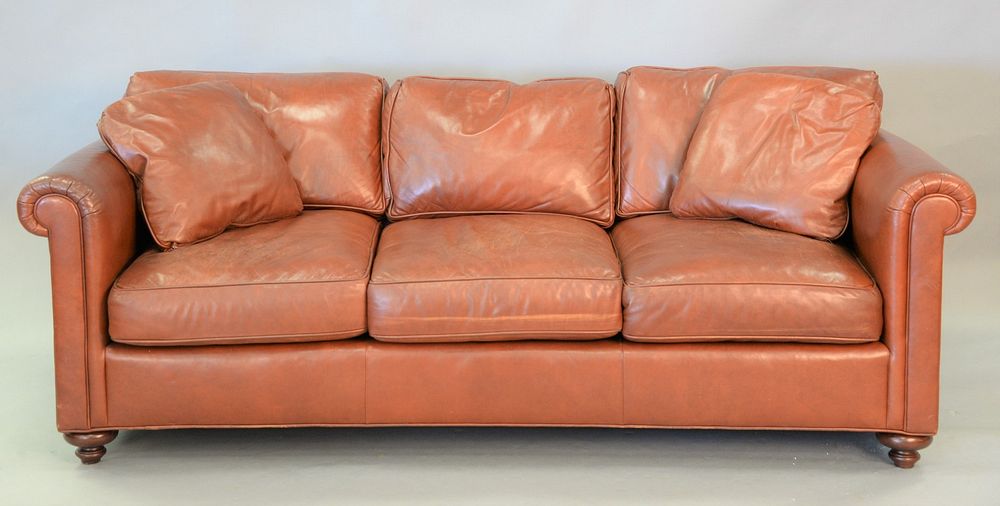 Appraisal: Baker leather upholstered three-cushion sofa lg Baker leather upholstered three-cushion