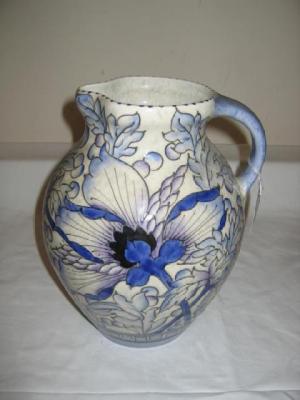 Appraisal: A BURSLEY WARE CHARLOTTE RHEAD JUG of bellied form with