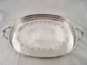 Appraisal: A silver plated two handled galleried tray x cm