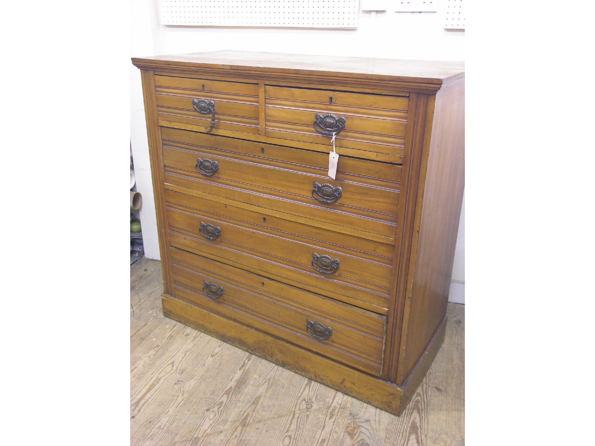 Appraisal: A late Victorian satin-walnut chest two short and three long