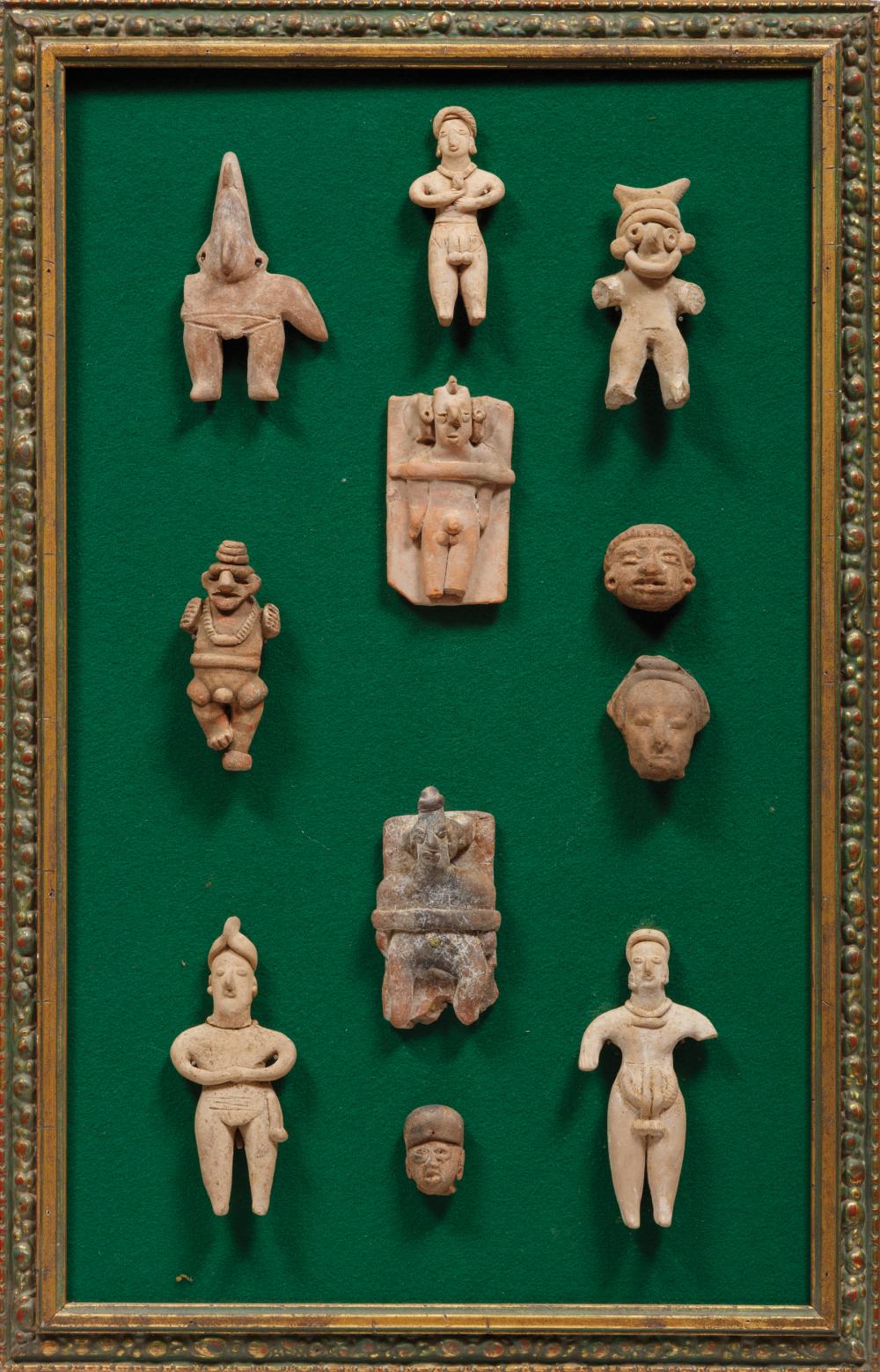 Appraisal: Eleven Framed Pre-Columbian Figures mounted on board h tallest figure